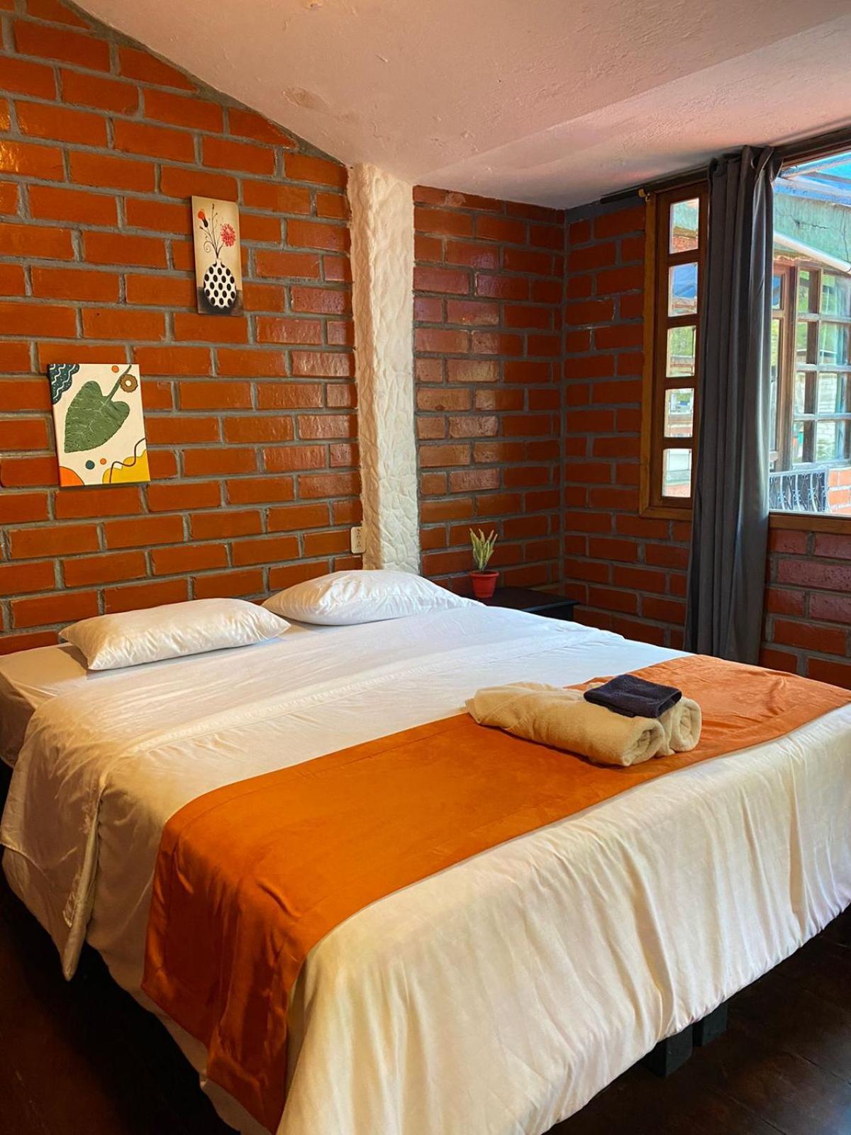 Garden House Hostal Baños Esterno foto