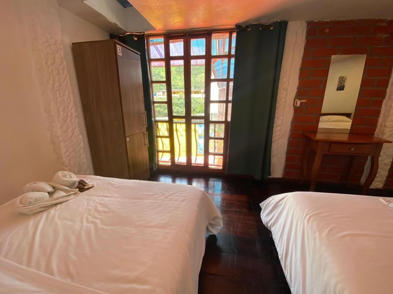 Garden House Hostal Baños Esterno foto