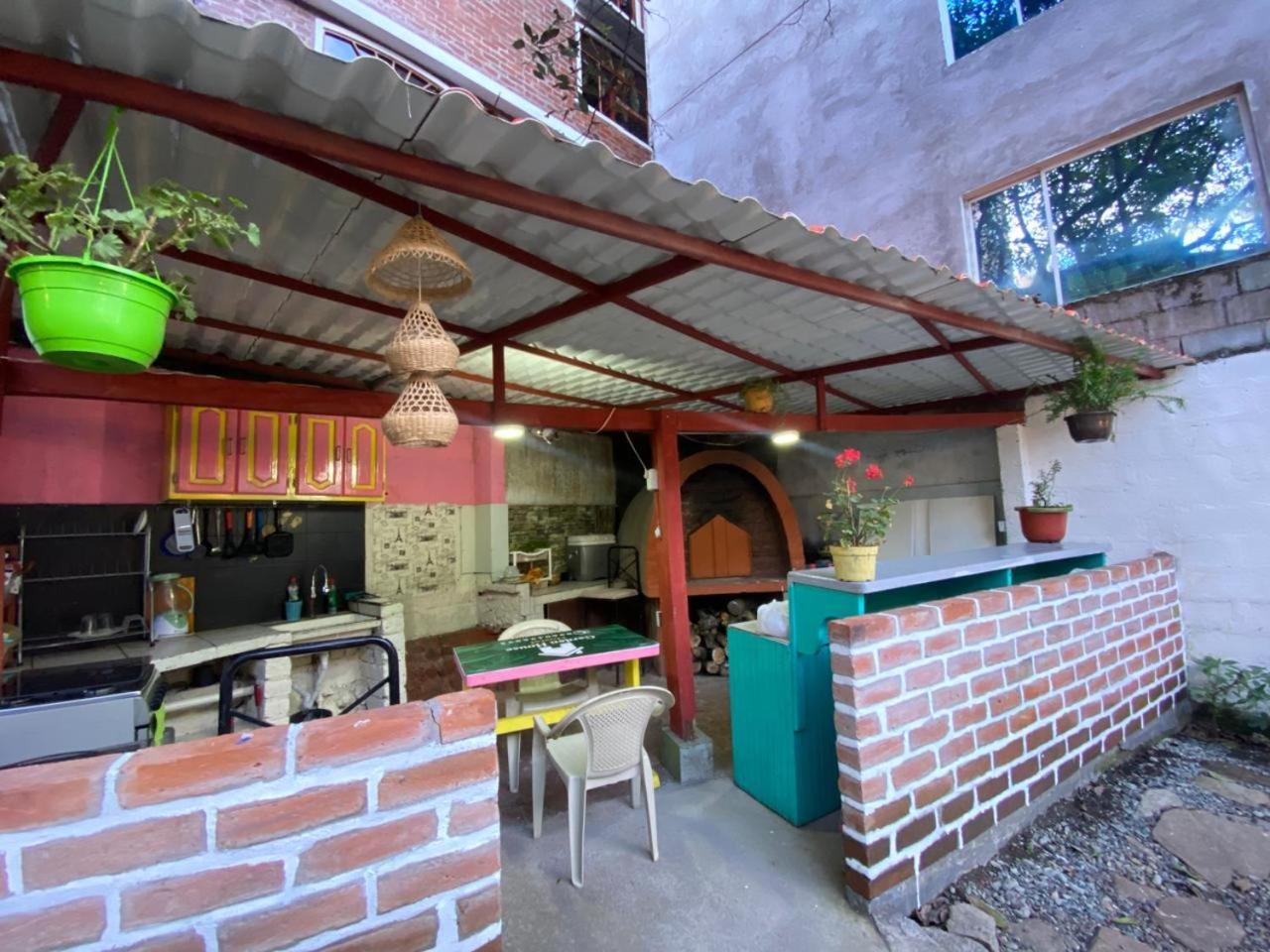 Garden House Hostal Baños Esterno foto